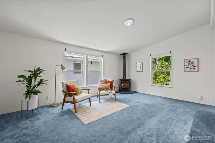 Family room with cozy propane stove.