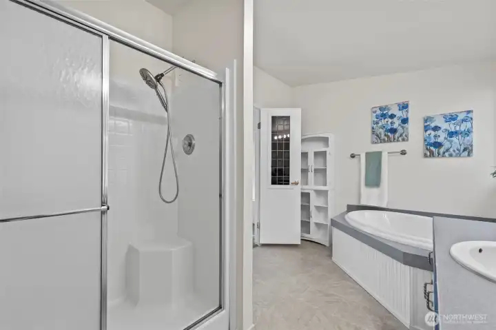Your roomy separate shower in the primary bath