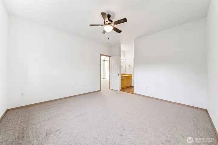 Another view of the primary bedroom