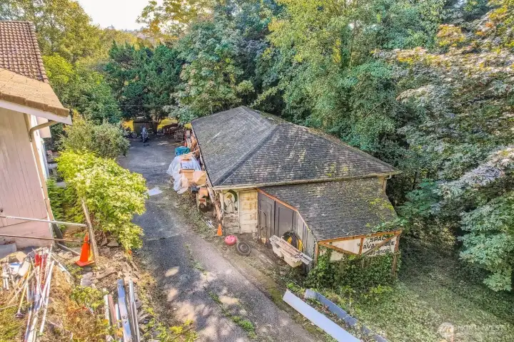 This is a great detached shop approximately 18' x 60' not counting extra storage on back.