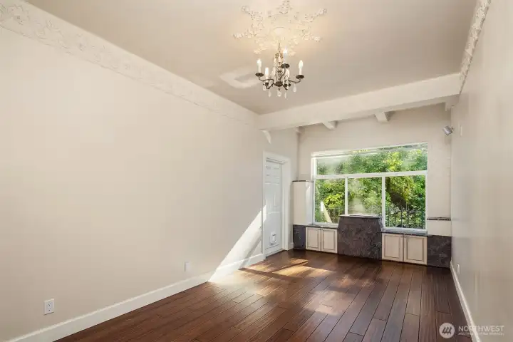Main floor den or office, with exterior access to back of home.