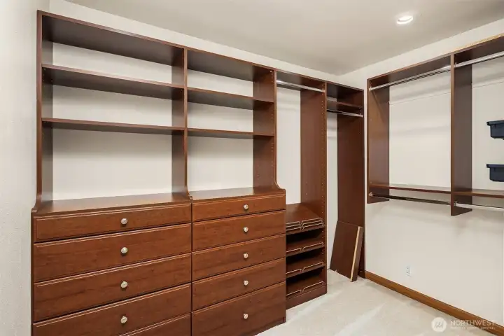 Walk-in closet in primary suite.