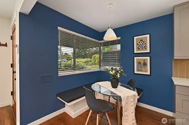 Dining area with convenient built-in seating.