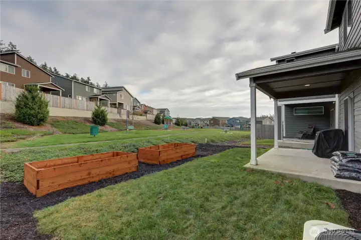 OK WHO DOESN'T LOVE THIS GARDEN AREA AND OPEN TO PLAY YARD AND WALKING TRAIL. THIS IS SUCH A WONDERFUL HOME! GET OVER HERE AND CHECK IT OUT. MAKE IT YOURS!!!