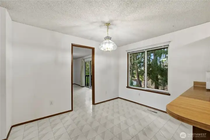 The dining room seamlessly flows to the family room.