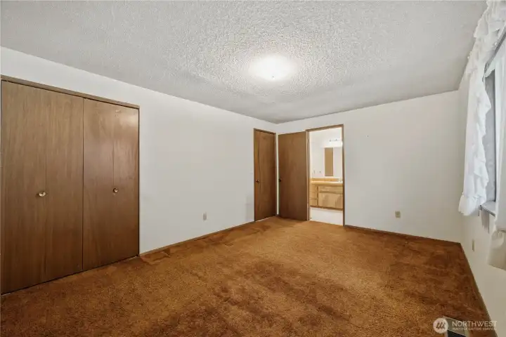 Primary bedroom has a separate entrance to the bathroom.