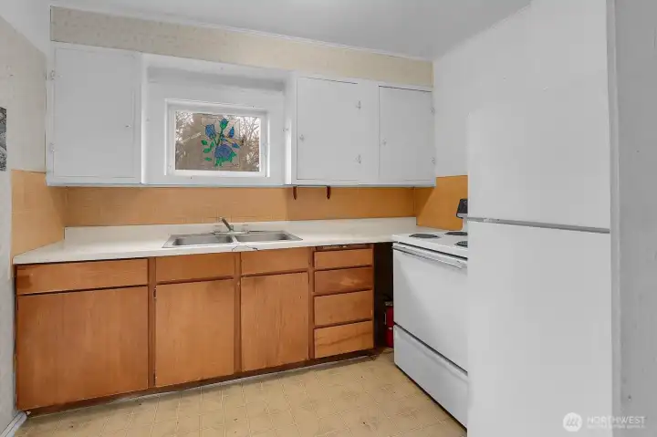 Kitchen window provides territorial view.