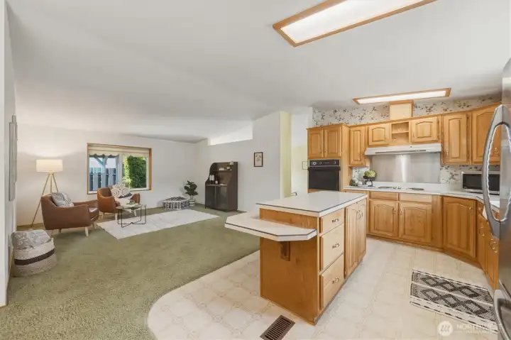 Nice open kitchen looking out to the family room.