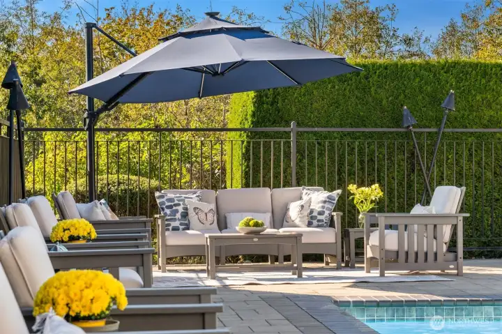 Privately treed and fenced, with sweeping golf course vistas.