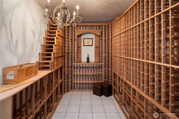 The temperature-controlled wine cellar is wrapped in rich cedar, offering an aromatic, old-world ambiance.