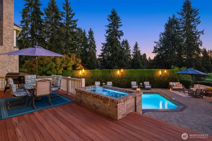 The entertainment-sized deck sits just steps from the magnificent resort-style pool.