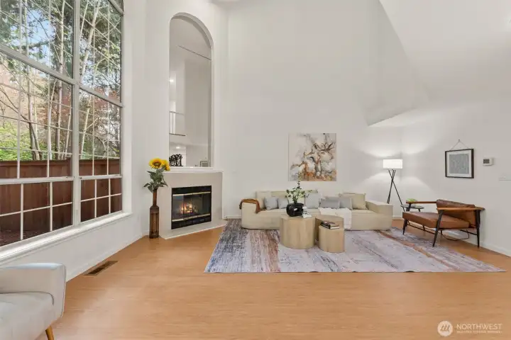 Family room with high-ceilings and tall windows