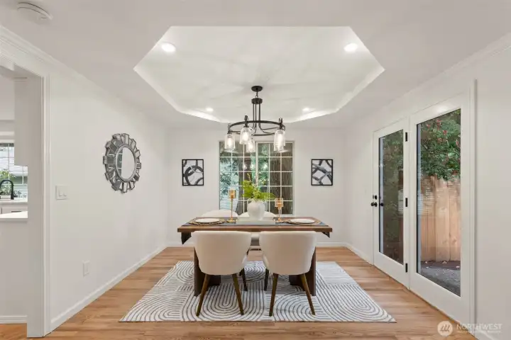 Formal dining room with access to the private backyard