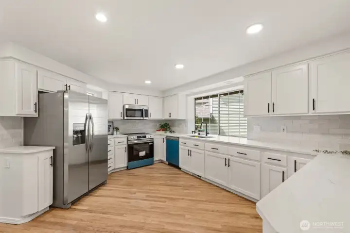 Brand new stainless steel appliances.