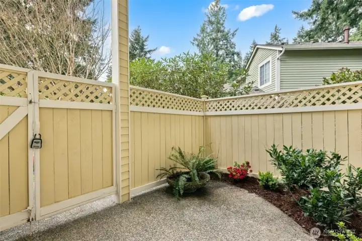 fully-fenced front yard
