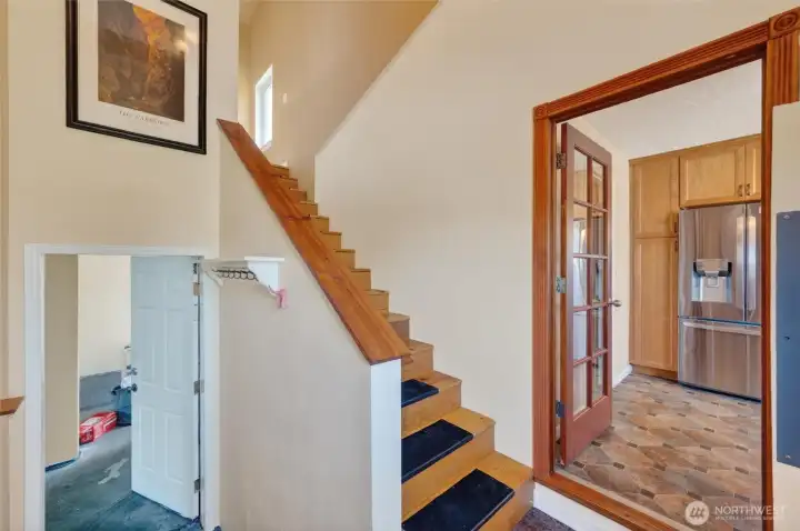 Main level entry, with kitchen to the right and great room upstairs that could potentially serve as an ADU.