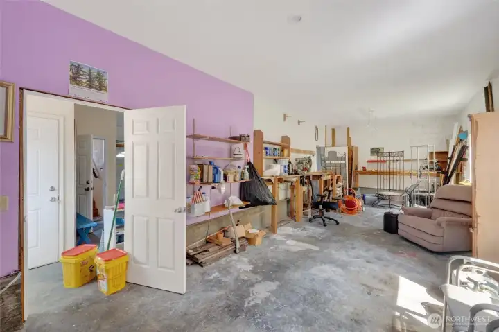 Large shop space next to garage.