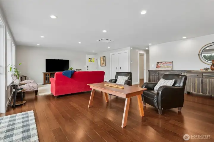 Looking back across the living areas, you really start to appreciate how versatile the footprint is, with enough openness to create multiple conversation zones, lounging areas or entertaining setups without the space ever feeling crowded. It gives you freedom to actually design around how you live instead of forcing furniture into awkward corners. Recessed LED lighting runs generously throughout, keeping the atmosphere bright, clean and current, while the entry closet near the front door adds that everyday practicality people always appreciate, and also note that the furniture is negotiable with the sale.