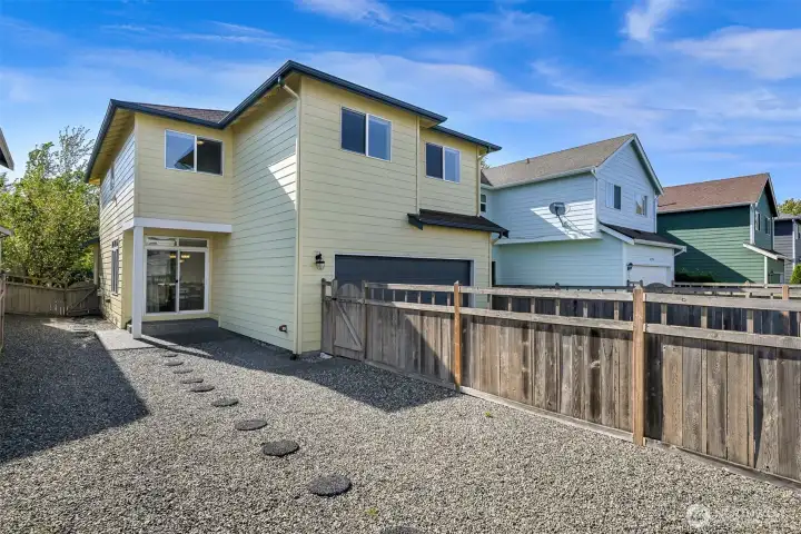 fully fenced yard that’s low-maintenance