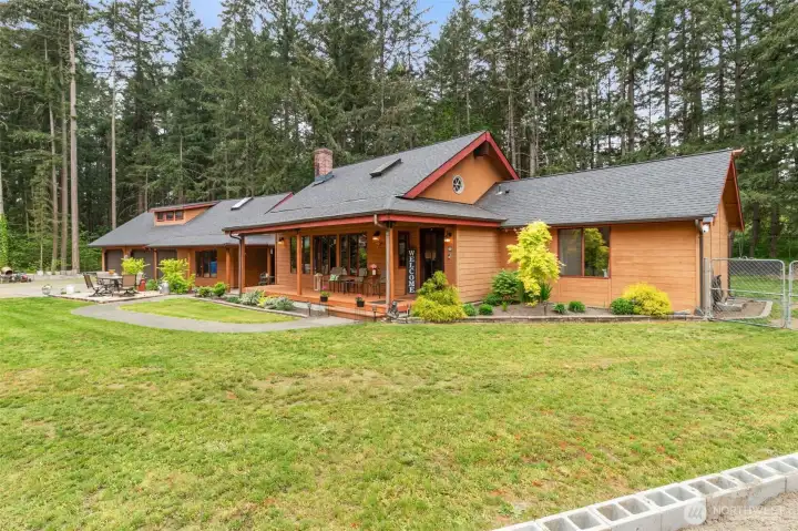 Covered front porch to enjoy the privacy