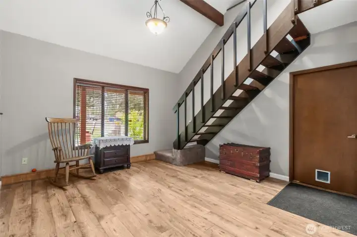 Den with access to loft area