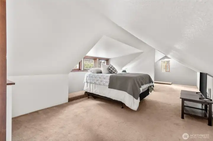 Extra large loft area w/separation for potential storage/closet