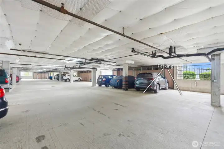 Parking garage. 3 stalls and 2 storage lockers.