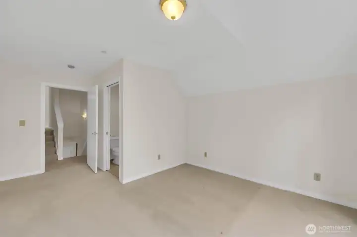 Upstairs main bedroom with its own 3/4 bathroom.
