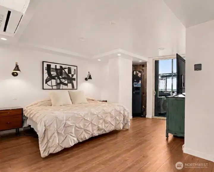 Primary Bedroom fits a king size bed and has access to the patio terrace
