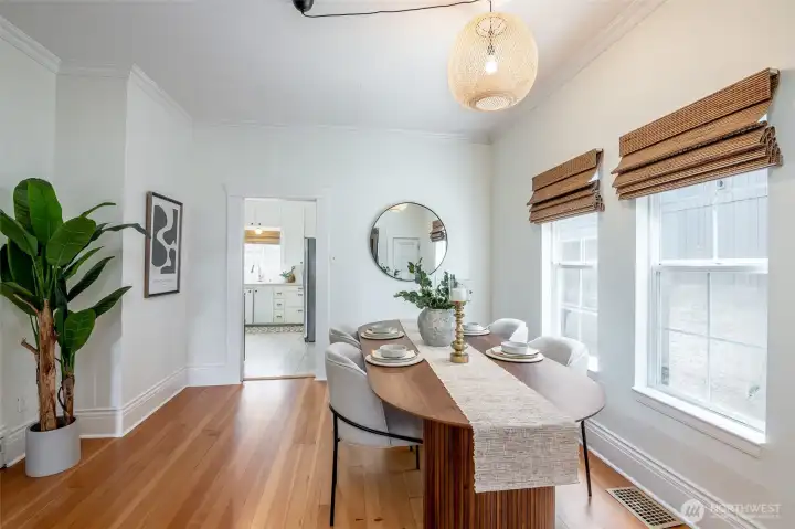 This pretty dining room sits between the living room and the kitchen.