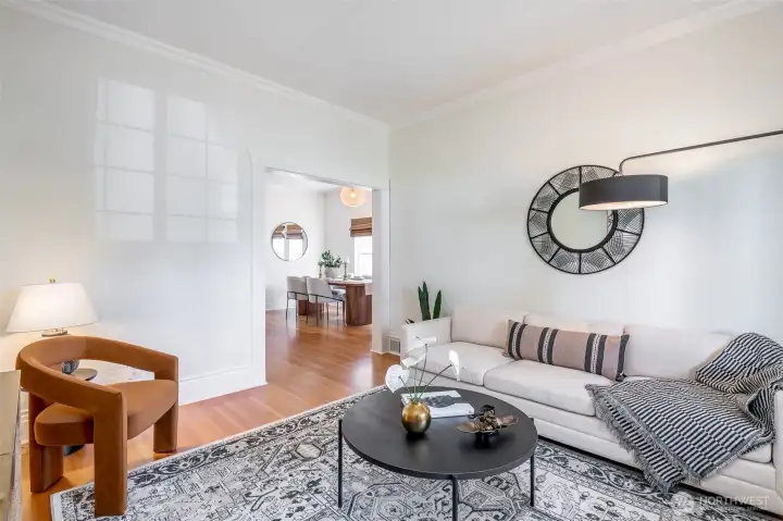 This bright room is nicely separated from the dining room and kitchen for a quieter space.