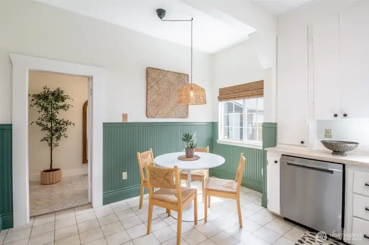 The sunny breakfast nook is filled with natural morning light.