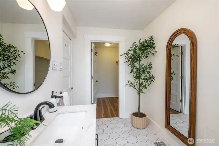Here is a peek at the walk-in closet that leads back to the primary bedroom.
