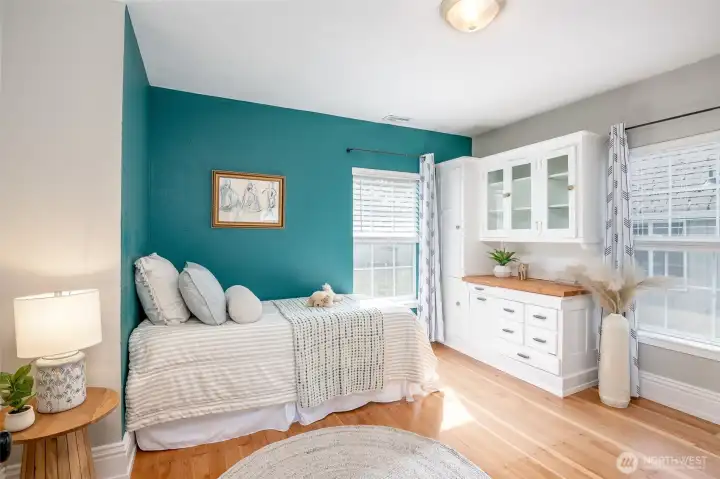 This bright room is charming with built-ins and lots of light.