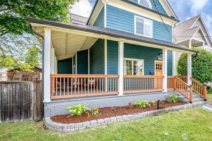 The wrap around covered porch is perfect for the rainy spring mornings and to enjoy sitting outside in the height of summer.