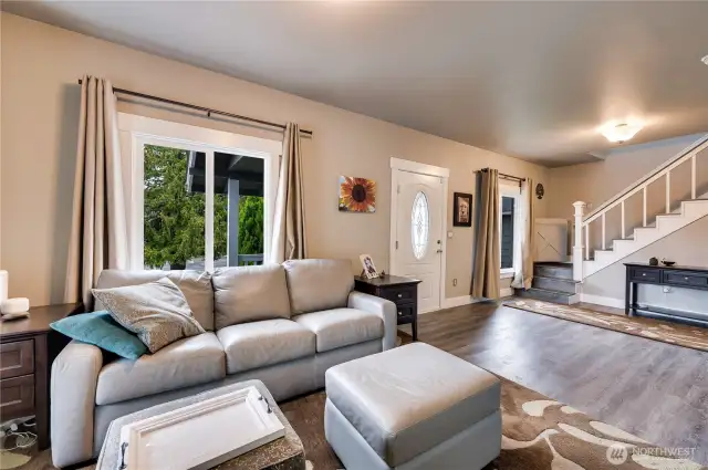 Living Room Looking Toward the Front and Staircase to 2nd Floor