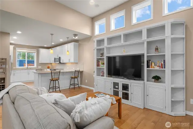Light filled, airy and bright.  The Engineered hardwoods are gorgeous!