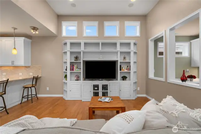 The spacious great room offers 12' ceilings, and great windows which allow so much natural light.