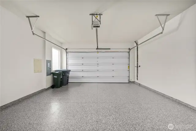 Fully finished garage with brand new epoxy finish.