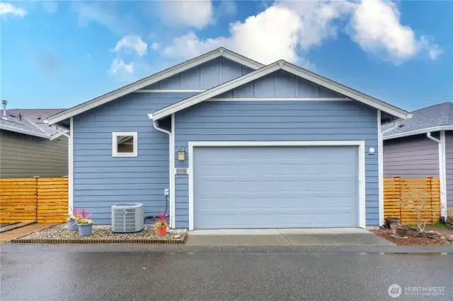 Fully finished 2 car garage with brand new epoxy finish and AC.