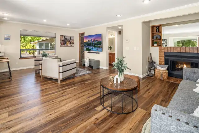 With cozy wood burning fireplace and built in cabinetry