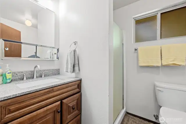 Useful 3/4 bath off of living room & garage.