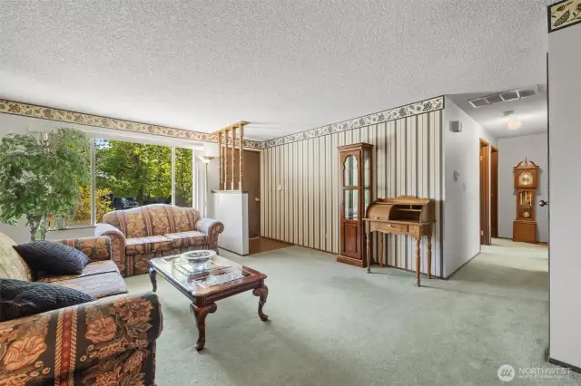 Hallway leads to 4 bedrooms and 2 bathrooms.