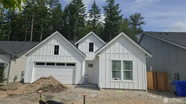 Welcome home to the Corvus Farmhouse with beautiful greenbelt views!  Fall move in!