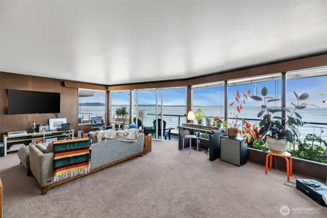 Unit 1 Very open concept living room is perfect for entertaining or enjoying the quiet of the ocean