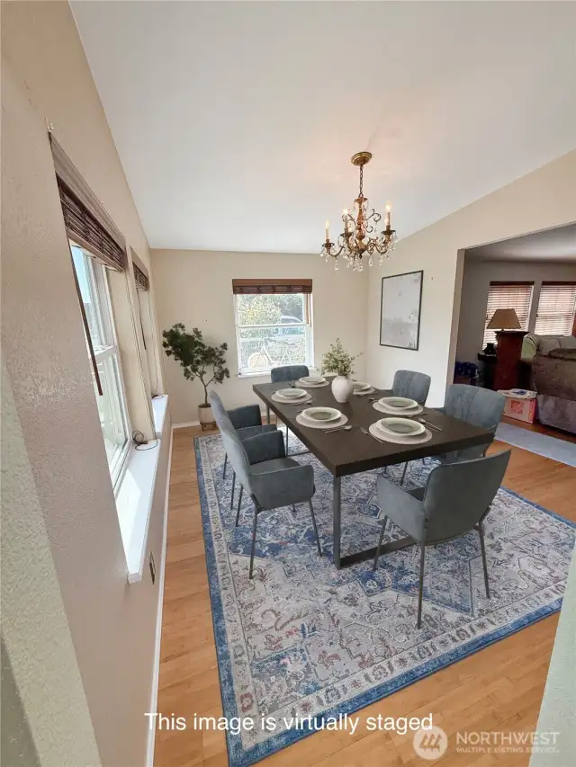 Virtually staged Dining room.