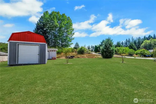 Two outbuildings.  Front outbuilding is 12x16, insulated with drywall and power.