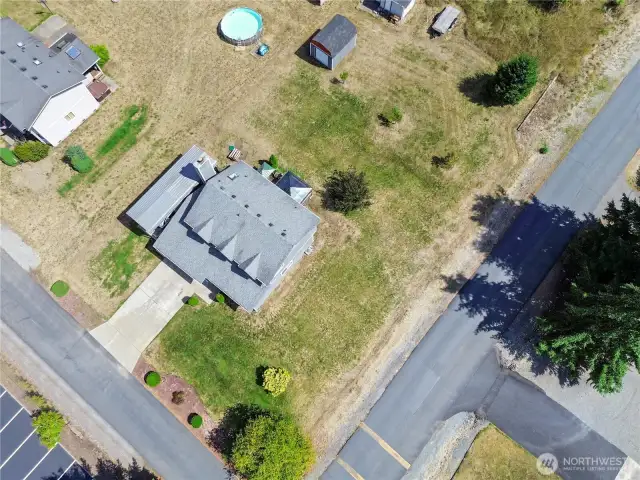 Large corner lot with ample parking.