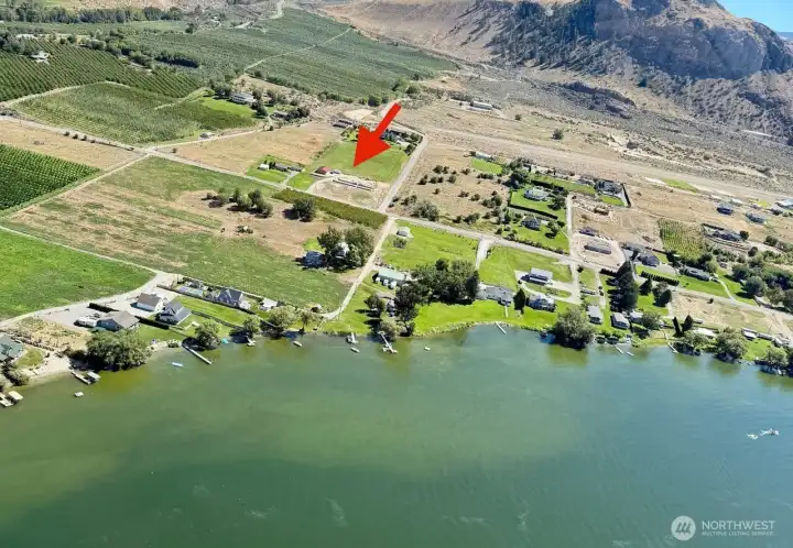 The red arrow shows the property and its relationship to Lake Osoyoos