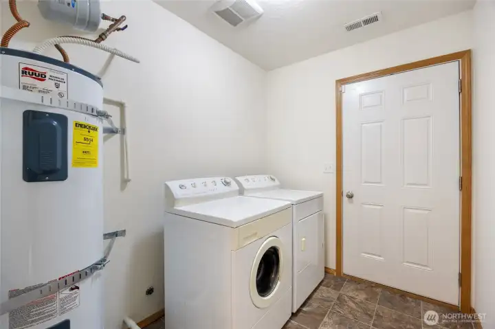 Laundry/mud room connects to the garage - Washer machine and dryer are included.
